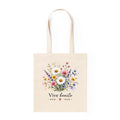 Bolsa de tela crema con flores silvestres en acuarela y texto Vive bonito